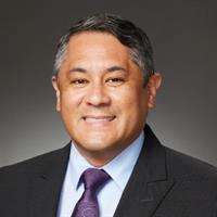 portrait of William E Posligua, MD
